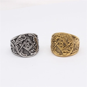 Vintage Freemason titanium steel rings in gold and silver finish on white background
