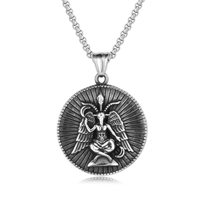 Detailed macro view of retro stainless steel Baphomet pendant with goat head and wings