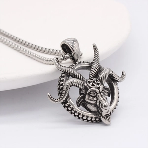 Vintage silver ram head pendant necklace with pentagram details and rustic titanium steel finish