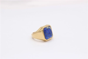Detailed top view of a gold-plated signet ring with a rectangular blue lapis stone