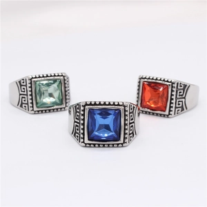 Vintage signet ring set with blue red green gemstones and Greek key pattern engravings