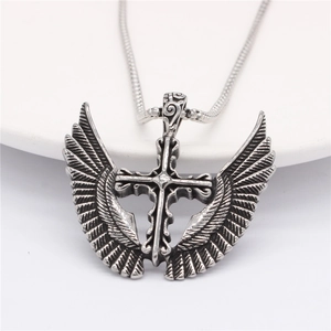 Vintage silver fallen angel cross pendant necklace with detailed wings on a snake chain