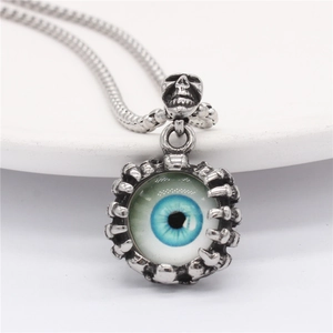 Retro punk devil eye necklace with silver skeletal hand pendant and skull ornament