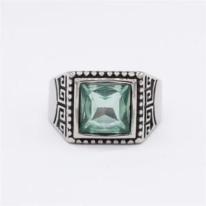 Retro stainless steel signet ring with square green gemstone and geometric patterns