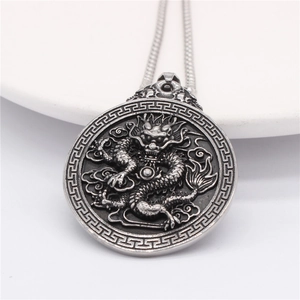 Vintage silver Chinese dragon relief pendant necklace with round medallion and snake chain
