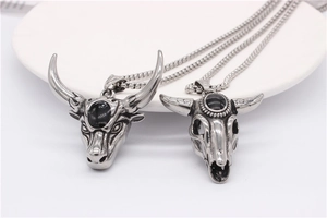 Retro bull head and skull necklaces in stainless steel with black stone insets