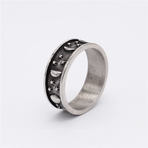 Retro titanium steel wide ring featuring embossed celestial star and moon patterns