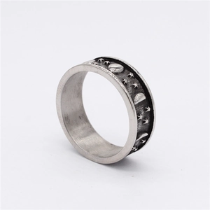 Retro titanium steel wide ring with embossed silver moon and star celestial motifs