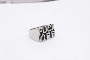 Macro detail of vintage silver steel ring featuring bold 3D Fuck Off lettering