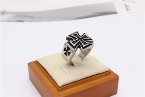 Detail view of gothic men's stainless steel ring featuring an Iron Cross with vintage finish