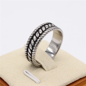 Retro vintage men's titanium steel ring featuring a double braided rope texture design