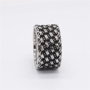 Retro titanium steel wide ring featuring a vintage braided knot design and oxidized finish