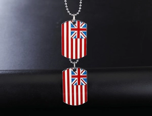 Close-up of double British flag dog tags with silver beaded chain for men's hip-hop style