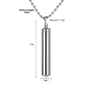 Macro detail of silver bullet pendant showing 47mm height and 9mm width dimensions