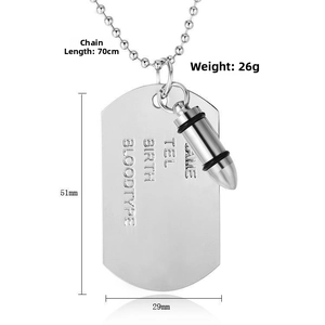 Detail of stainless steel military dog tag and bullet pendant with identification engravings