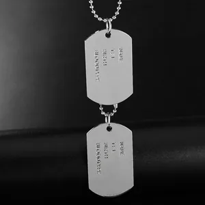 Polished silver dog tag necklace with customized soldier identity engravings on bead chain