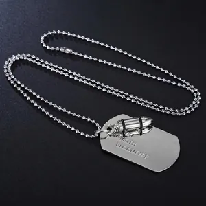 Tactical bullet and dog tag necklace set in stainless steel on black leather background