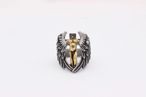 Detailed close-up of retro gothic angel and cross relief on silver stainless steel ring