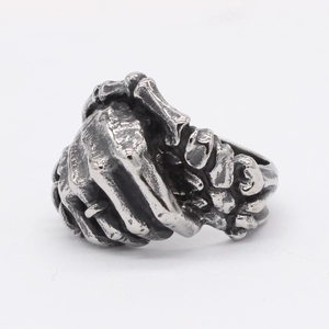 Gothic punk handshake ring with skeletal hands made of vintage oxidized titanium steel