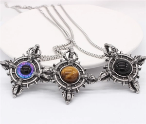Retro stainless steel cross vajra pendants with stone centers on silver chains