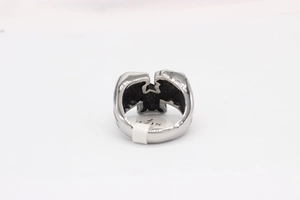 Detailed view of vintage rock punk eagle ring in titanium steel showing size 7 label