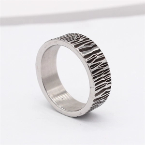 Retro mens stainless steel ring with rustic tree bark texture and industrial silver finish