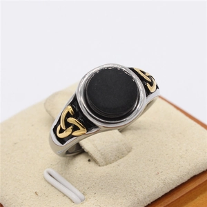 Retro Viking stainless steel ring for men with black stone and gold celtic knot accents