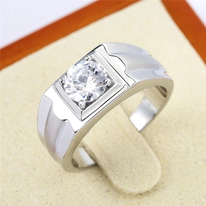Mens minimalist silver wedding ring with round diamond center on display stand