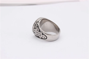Detailed side view of vintage knight ring featuring intricate Celtic knot hollow patterns