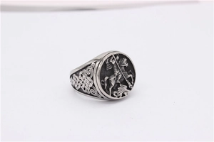 Detailed relief of Saint George slaying the dragon on vintage silver men's signet ring