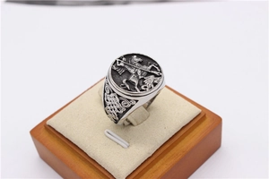Detailed relief of a vintage knight on a silver oxidized signet ring for men