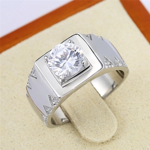 Macro detail of men's wide silver ring featuring a large solitaire zircon in a square setting