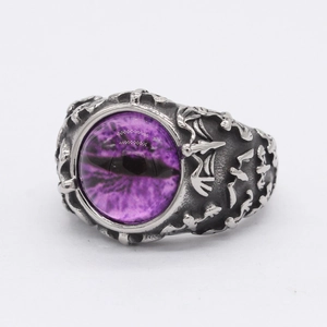 Retro gothic titanium steel ring featuring a purple magic eye and bat wing carvings