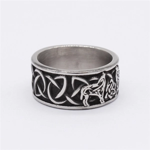 Vintage Viking wolf head ring with Celtic knot patterns in antique steel finish