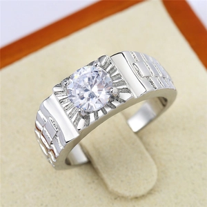 Close-up of men's silver ring featuring a large round zircon and textured band