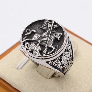 Retro Saint George and the Dragon silver ring with Celtic knot details and vintage finish