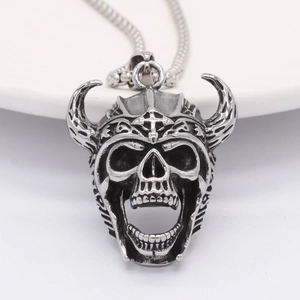Gothic skull pendant necklace with curved horns and cross engraving in silver titanium steel