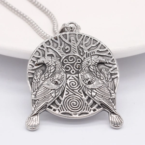 Vintage Viking crow and eagle stainless steel pendant necklace on white plate