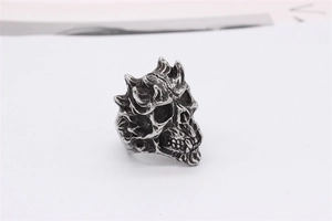Detailed view of vintage gothic skull ring with oxidized finish and intricate metalwork