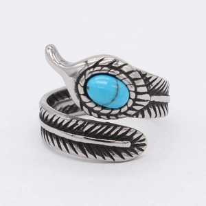 Bague plume vintage en acier inoxydable avec pierre turquoise ovale et finition argent vieilli