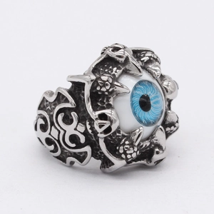 Gothic skull ring for men in antique silver finish with a blue evil eye centerpiece