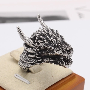 Retro stainless steel dragon head ring with detailed silver scales and carvings