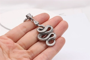 Detailed view of the antique silver snake pendant showing realistic scale textures