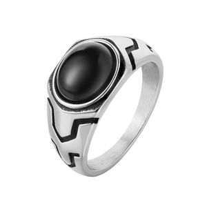 Vintage stainless steel ring for men featuring an oval black gemstone and geometric engraving