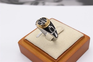 Detail of Eye of Horus and Ankh cross symbols on vintage stainless steel ring
