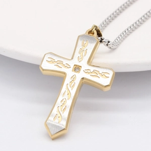 Pendentif croix pour homme en acier inoxydable bicolore avec une petite pierre de zircon