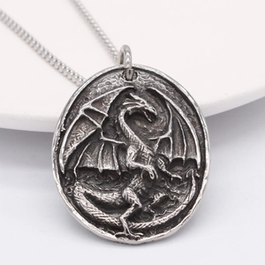 Retro stainless steel dragon relief pendant necklace with vintage silver finish for men