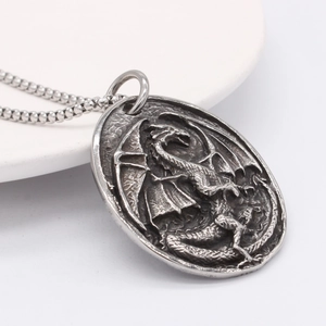 Vintage silver dragon relief oval pendant necklace made of durable stainless steel