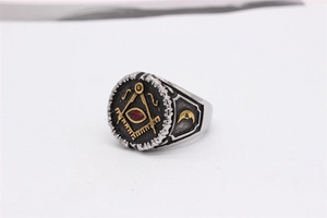 Detail of Masonic ring with red marquise zircon and compass square symbols