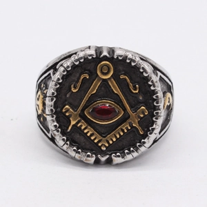 Retro stainless steel Freemason ring with red gemstone and golden embossed side details